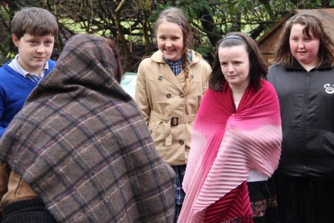 Aishling speaks to a beggar woman